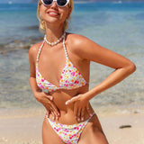 Swim Vcay Conjunto de bikini de cuello halter estampado aleatorio con flores para separar la ropa de playa y la ropa de bano en verano