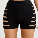 PETITE Shorts negros elasticos de cintura alta tejidos con diseno recortado