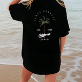 Camiseta de manga corta suelta casual de a grande con estampado de arbol de coco y letras, SANTA BARBARA EST 1987 California Surf The Sun