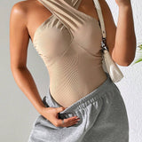 Essnce Body sin mangas de cuello halter cruzado para mujer con capucha, estilo de ajuste delgado, diseno tipo wasteland