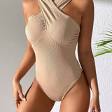 Essnce Body sin mangas de cuello halter cruzado para mujer con capucha, estilo de ajuste delgado, diseno tipo wasteland