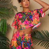 TRVLCHIC Conjunto de dos piezas para mujer en verano de camiseta con estampado de plantas tropicales y pantalones