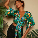 TRVLCHIC Blusa de manga acampanada con nudo frontal de verano para mujer, tejido de vacaciones, atuendos de festival de rave, camisas casuales para mujer, crop top, camisa hawaiana, cardigan de verano