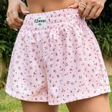 EZwear Shorts de pierna ancha con detalles de parches de letras en estampado floral rosa para salir en verano