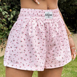 EZwear Shorts de pierna ancha con detalles de parches de letras en estampado floral rosa para salir en verano