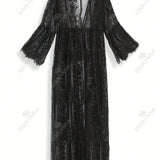 Vestido de playa de encaje semi-translucido negro tipo tunica con abertura frontal para cubrir la ropa de bano