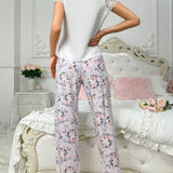 Conjunto de pijama para mujer con blusa de encaje de unicolor y pantalones largos con estampado floral