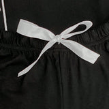 Conjunto de ropa de dormir para mujer elegante multicolor con un sueter cardigan de manga corta y shorts con cordon