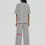 Coolane Camiseta de manga corta con impresion de letra y pantalones largos casuales con cordon en el dobladillo, conjunto de 2 piezas para mujeres, primavera / verano
