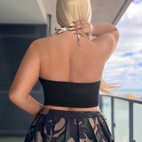 Top de tirantes corto con cuello halter para mujeres de a grande en contraste de camuflaje decorado con estrella de diamantes de imitacion para verano