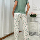 Conjunto de pijama para mujer con estampado floral que incluye una camiConjuntoa casual con cuello redondo de manga corta en unicolor y pantalones de dormir