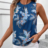 Blusa de mujer sin mangas con estampado floral azul y pliegues en la parte delantera