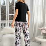 Conjunto de pijama de manga corta de unicolor con pantalones largos impresos de flores