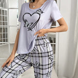 Conjunto de pijama con camiConjuntoa de manga corta con estampado de corazon y mariposa, y pantalones largos a cuadros con estampado de mariposas
