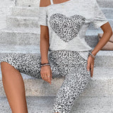 LUNE Conjunto casual de dos piezas para mujer de camiseta de manga corta con cuello asimetrico y leggings con estampado de leopardo de corazon para verano