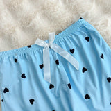 Conjunto de pijama de 3 piezas con pantalones cortos decorados con lazo y estampado de corazones