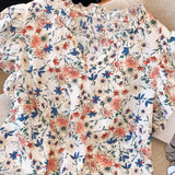 Camisa diaria simple de a grande para mujer con estampado floral pequeno