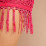 Haute Conjunto de top y falda rosa con borlas y flecos de ganchillo