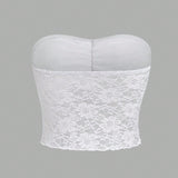 MOD Top decorado con encaje blanco con lazo envuelto en el pecho y transparente