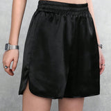 Coolane Shorts de moda negros brillantes de elastano