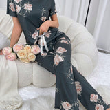 Conjunto de blusa de manga corta y pantalones largos impresos con flores para mujeres