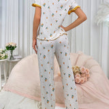 Conjunto de pijama de mujer con estampado floral y bloque de color con borde de volantes