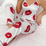 Conjunto de pijama de camiConjuntoa de tirantes y pantalones largos con estampado de labios con textura similar a la seda