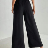 Tall Pantalones negros anchos con nudo delantero solido