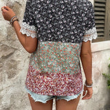 Camisa de mujer con botones de manga corta con estilo de vacaciones con estampado floral