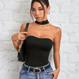 PETITE Mono negro reversible de cuello halter para mujeres