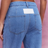 MISSGUIDED Jeans ajustados con diseno de cintura asimetrica y dobladillo desgastado