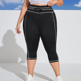 Pantalones deportivos Capri de talla grande con diseno de linea, bolsillos y cinturilla ajustable, tamiben leggings ajustados para las piernas
