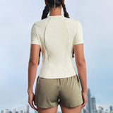 Conjunto deportivo de verano de mujer con cuello alto, manga corta con cremallera y shorts