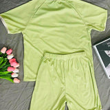 Conjunto de pijama casual comodo para mujer de primavera/verano con camiConjuntoa de manga corta y pantalones cortos de unicolor, agradable para la piel