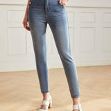 MOTF Classy JEANS AJUSTADOS CON BOLSILLOS EN DIAGONAL Y DETALLE DE BOTON DORADO