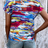 Camisa de mujer con mangas cortas y cuello redondo con estampado colorido impreso