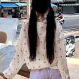 DAZY Top corto para cubrir, manga larga y estampado de mariposas para mujer en cuello asimetrico de vacaciones con lazo