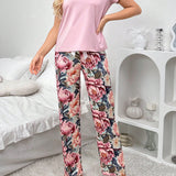Conjunto de blusa de manga corta y pantalon largo con diseno de bloques de color y estampado floral con lazo