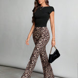 Tall Pantalones acampanados de punto con estampado de leopardo para mujer