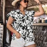 Camisa de verano de a grande con estampado floral y cuello con muesca