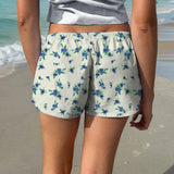 EZwear Pantalones cortos de cintura baja con cordon y estampado floral para vacaciones en la playa para mujer
