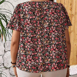 Blusa casual de manga corta y corte holgado con estampado floral pequeno perfecta para vacaciones campestres de mujeres de a grande en verano. Con cuello redondo y mangas con volumen.