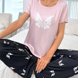 Conjunto de camiConjuntoa de manga corta y pantalon largo con impresion de mariposa y bloques de color