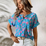 Camiseta de moda casual de verano con estampado floral azul y cuello en V