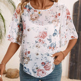 Jersey de mujer de chiffon con estampado romantico de plantas y flores en gris y dobladillo irregular, confeccionada con tela transpirable, comoda y elegante