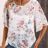 Jersey de mujer de chiffon con estampado romantico de plantas y flores en gris y dobladillo irregular, confeccionada con tela transpirable, comoda y elegante