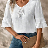 Blusa casual de algodon y lino de manga corta con cuello en V y dobladillo con volantes para mujeres