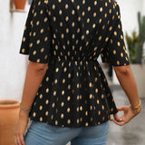 Blusa con estampado de lunares dorados y nudo en la parte frontal