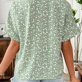 Blusa con estampado floral pequeno y mangas estilo murcielago