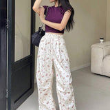 DAZY Pantalones casuales con estampado floral Ditsy y cordon de ajuste